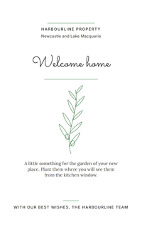 Front of a Hairline Botanical seed packet from a real estate agency: Welcome home in green script above an olive sprig
